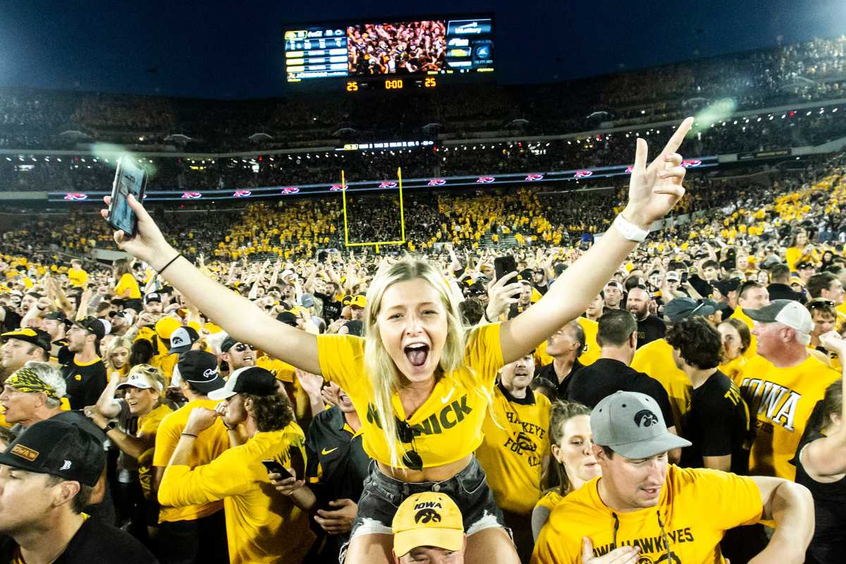 Iowa fans celebrate their team's 23-20 win over Penn State at Kinnick Stadium. (Joseph Cress/Iowa City Press-Citizen)